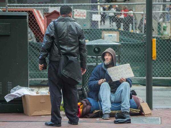 Giving money to homeless people